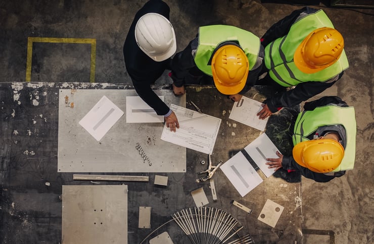 workers-with-helmets-in-constuction-site