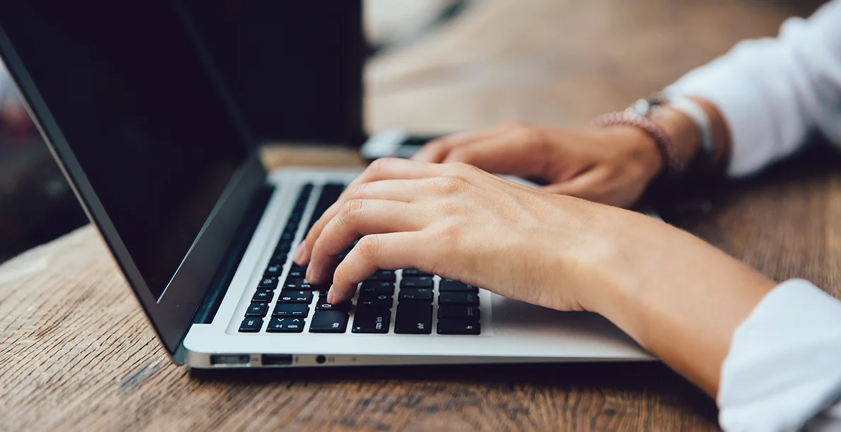 female-hands-typing-keyboard-netbook-close-up-view-business-concept